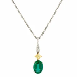 Platinum & 18K Yellow Gold Necklace With A Yellow Diamond & Emerald Pendant